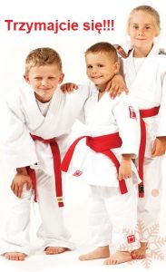 Zdjęcie judoków z napisem "Trzymajcie się!"